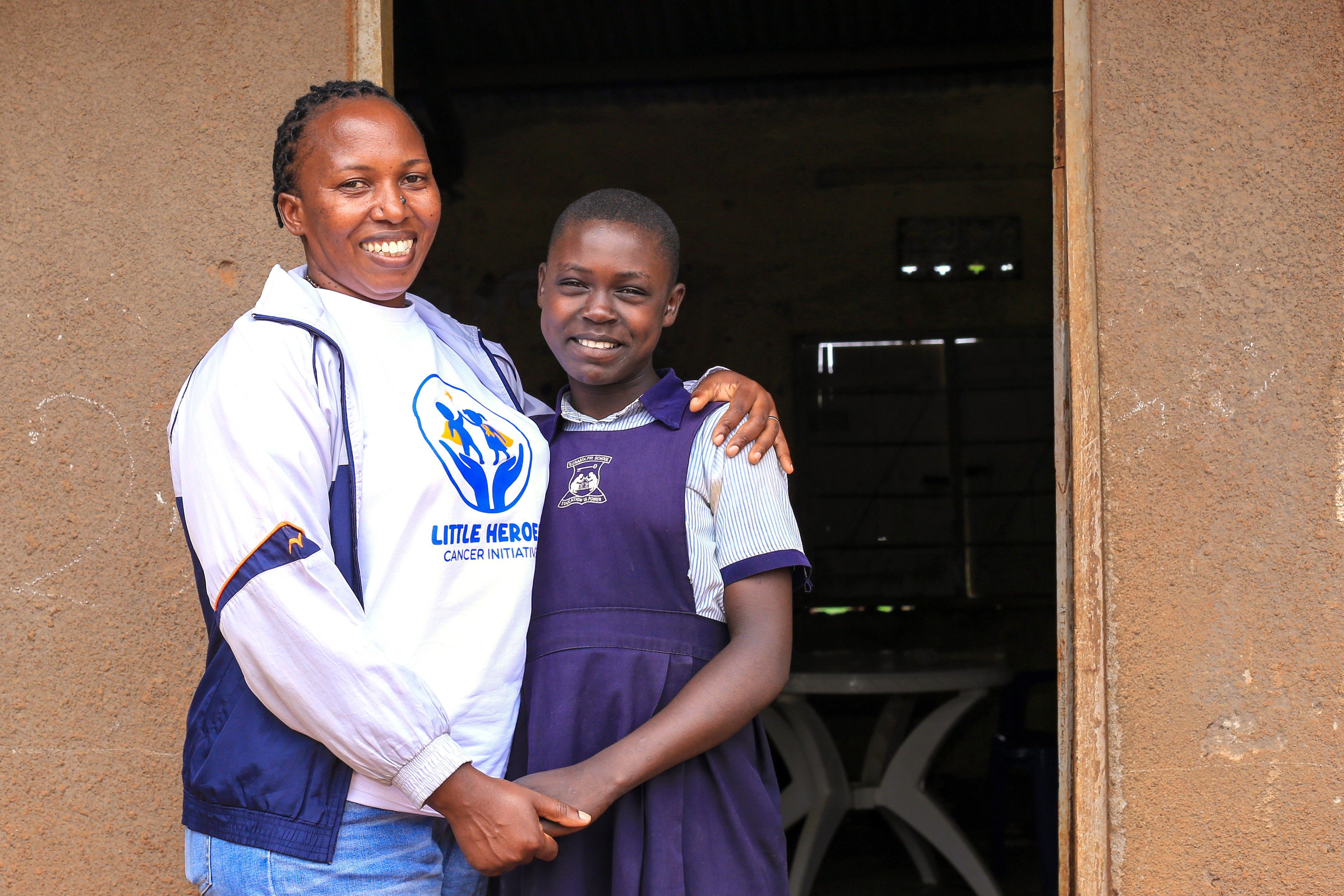 Little Heroes founder sharing a joyful moment with a student