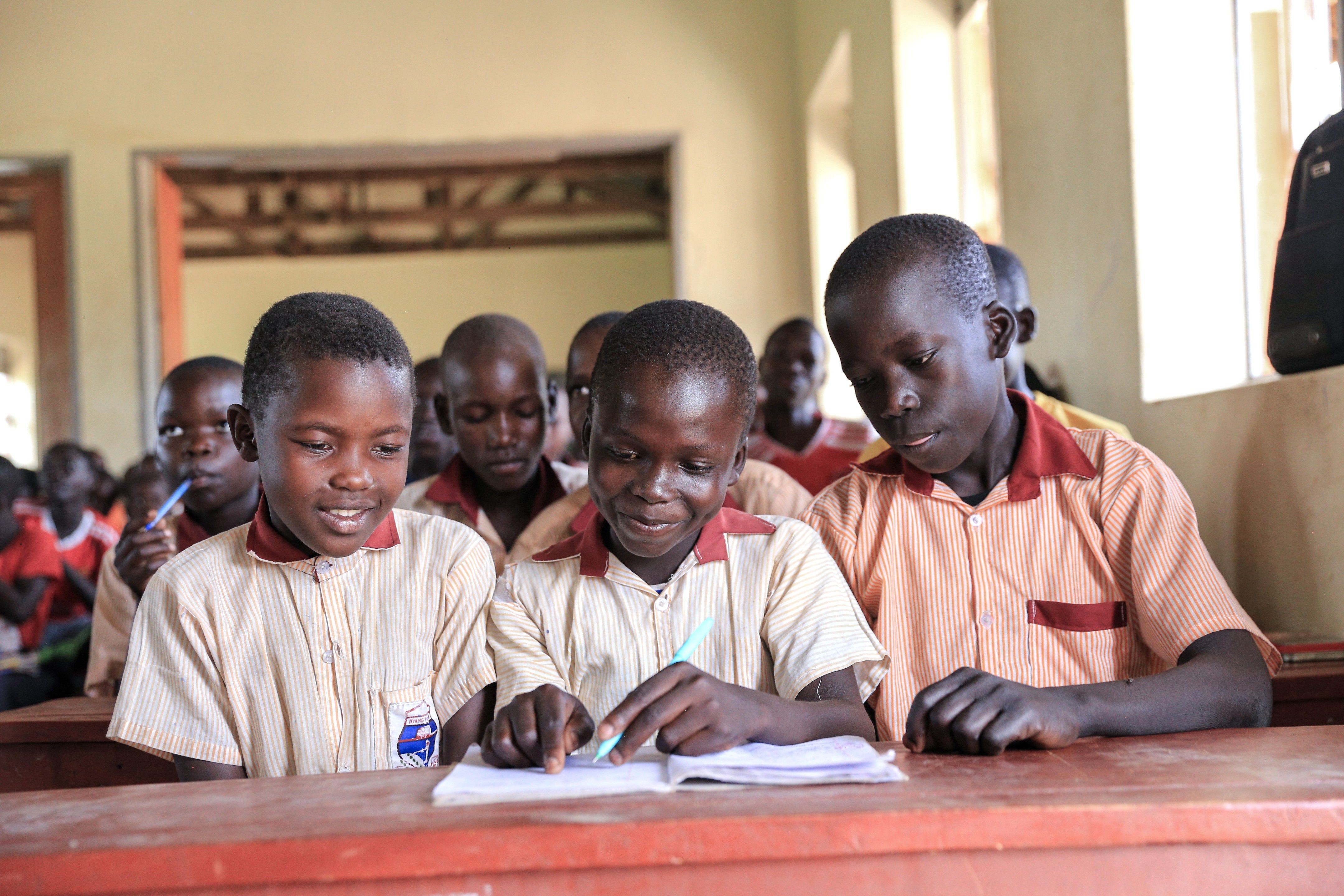Students learning together in a Ugandan classroom